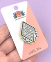 Jubly Umph Lapel Pin • Don't Let The Bastards Grind You Down