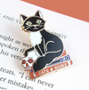 Jubly Umph Lapel Pin • Cats and Books